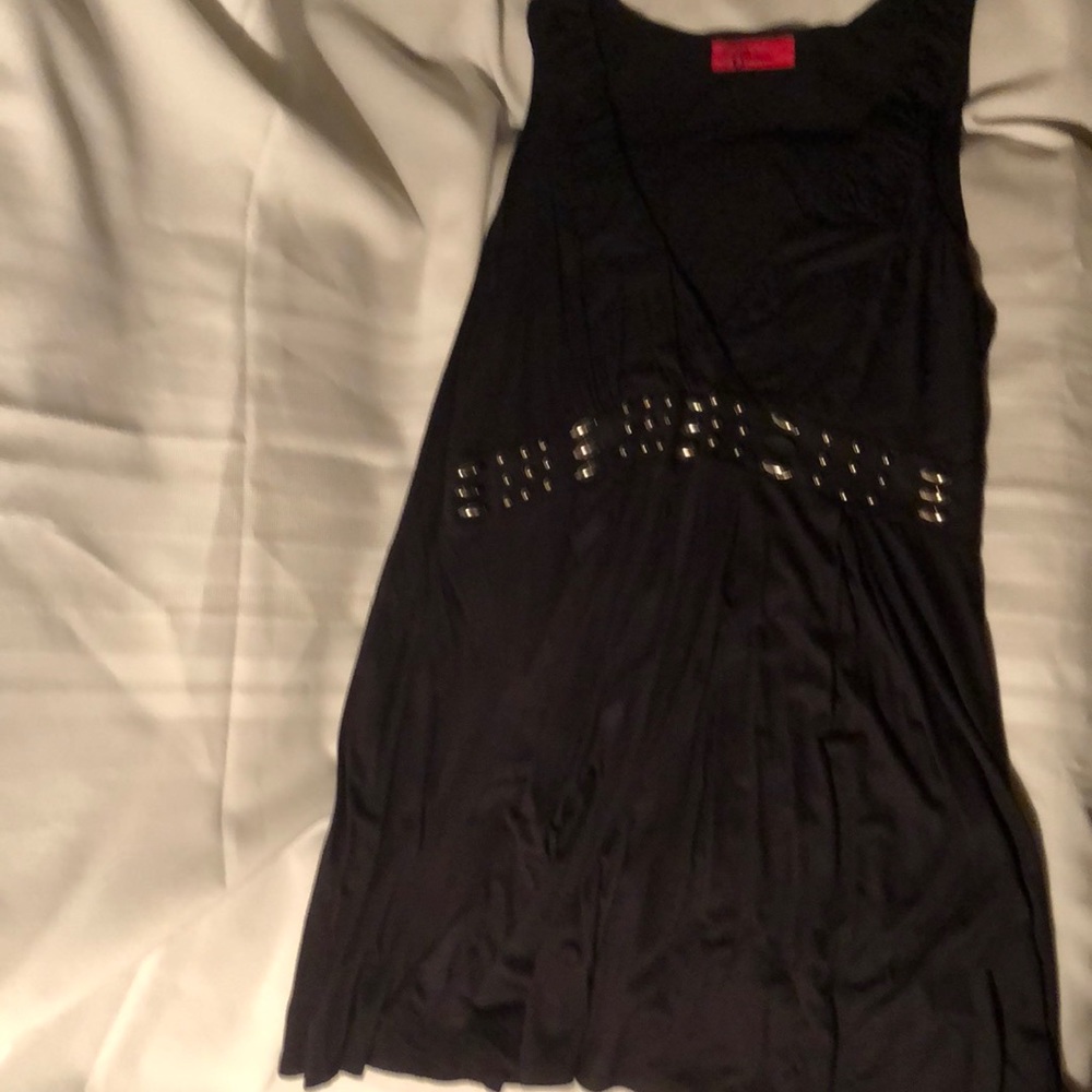 Women’s black sleeveless blouse.